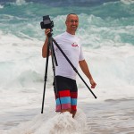 Jon Cornforth photographing surf on the North Shore of Oahu